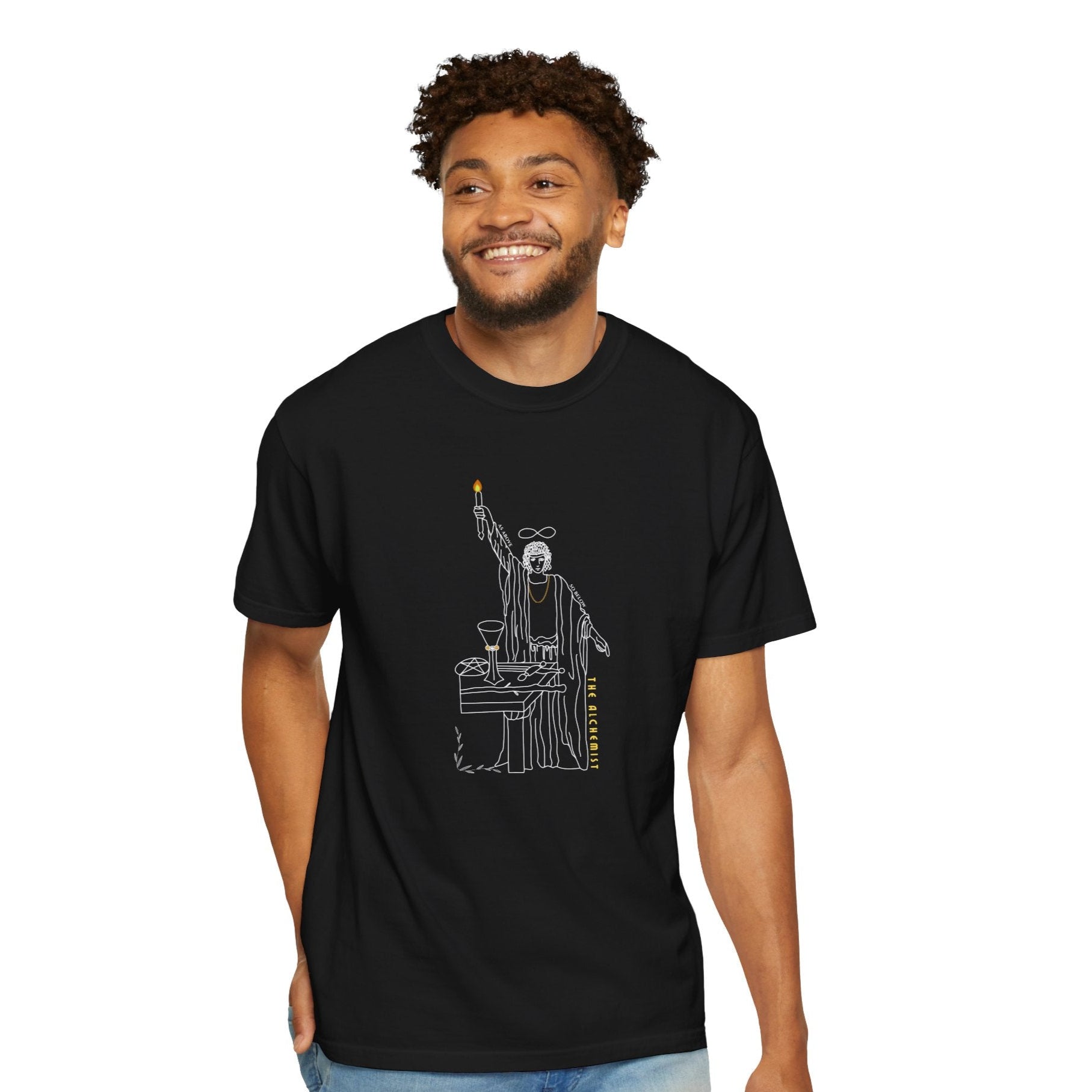Man wearing a black t-shirt with a white graphic design of a magician.